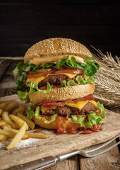 Big Tasty burger with beef and fried potatoes.