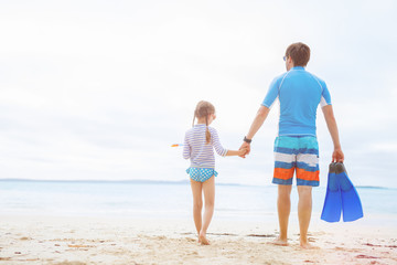 Father and daughter at beach