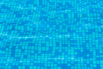 Texture of blue water in the pool