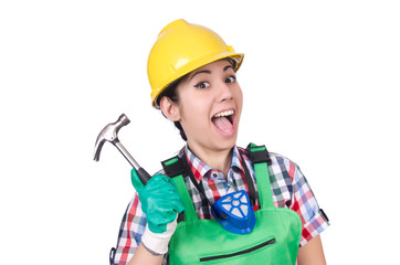 Female worker with hammer isolated on white