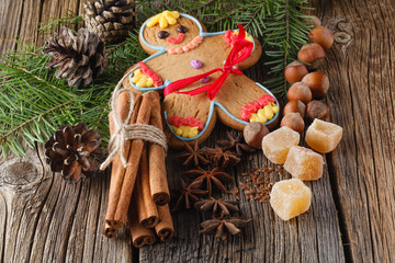Gingerbread man on christmas spices, chinnamon, anise