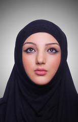 Muslim young woman wearing hijab on white