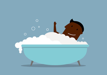 Businessman in a bath with foam