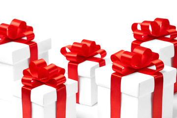 White gift box with red ribbon bow