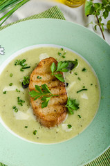 Creamy leek herby soup with toast