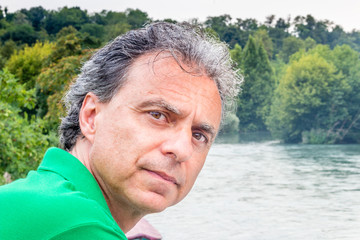 handsome man and flowing river