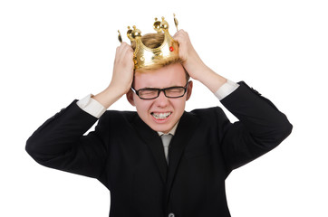 Fototapeta premium Young businessman with crown isolated on white