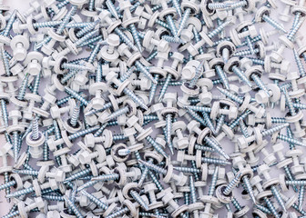 Many screws arranged as background