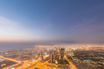 Fototapeta na wymiar Panorama of night Dubai during sunset