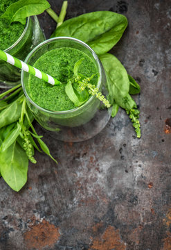 Healthy smoothy of fresh green spinach leaves. Detox concept