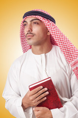 Fototapeta premium Arab man praying on white