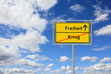 Street sign with the word war - Freedom