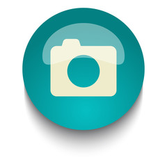 Camera vector icon on blue green glossy glass button on white ba