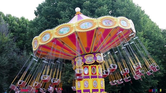 Carousel swings in amusement park 