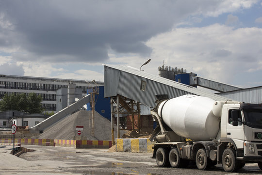 Industrial Cement Processing Plant. the foreground of a truck mixer