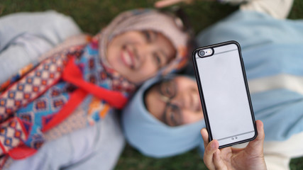 mother and her doughter taking a selfie