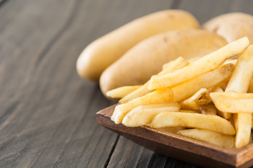 french fries on wood background