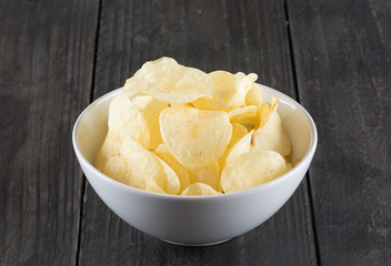 potato chips on wood background