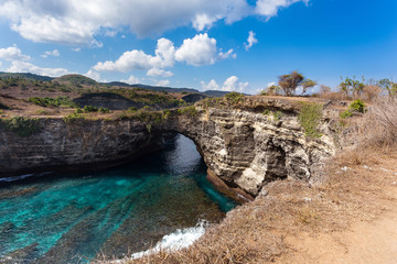 Fototapeta premium tunnel crater coastline at Nusa Penida island