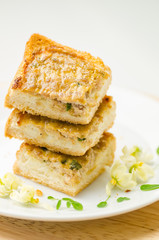 Bread with pork on top (Thai food) on plate
