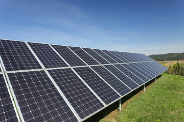 Solar Power Station on the summer Meadow