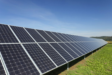 Solar Power Station on the summer Meadow