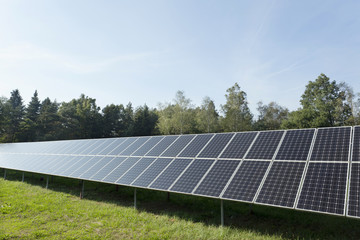 Solar Power Station on the summer Meadow