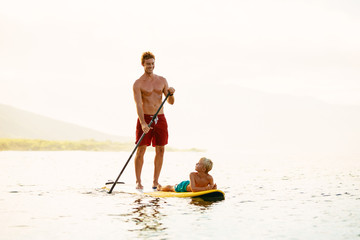 Father and Son Stand Up Paddling