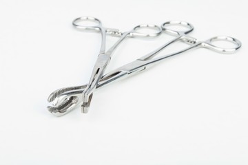 Stainless steel surgical forceps. Stock image macro.