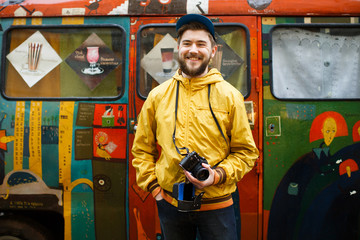 Hipster looking to the side and laughing