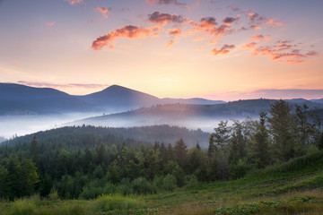 Fototapeta na wymiar Stunning sunrise mountain landscape with vibrant colors and