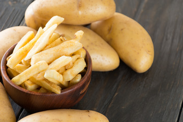 french fries on wood background