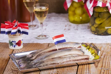 Foto op Aluminium Dutch herring ('haring') with onions and pickles © sara_winter