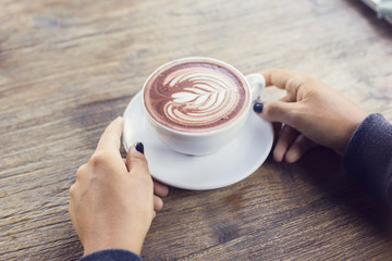 Girl with cup of coffee