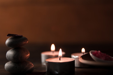 Beautiful Spa composition with aroma candles on wooden . Treatment, aromatherapy