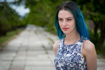Naklejka premium Blue haired girl walk