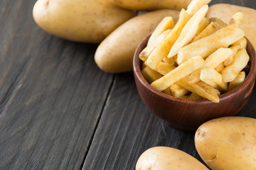 french fries on wood background