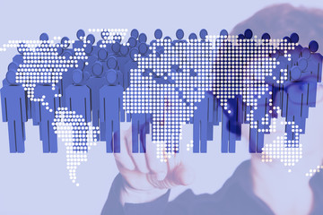 Woman pointing at world map with people