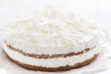 chocolate cake with coconut cream, close-up