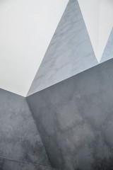 Abstract concret wall chaotic polygonal relief pattern