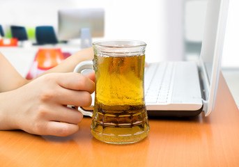 drinking and working at the office