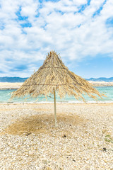 Beach umbrella on a windy day