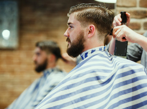 Bearded man in a barber shop