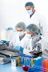 Group of medical doctors in laboratory.