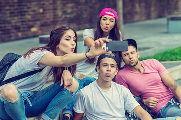 Skateboarder friends on the stairs, made selfie photo