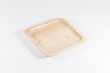 Wooden plate isolated on white background