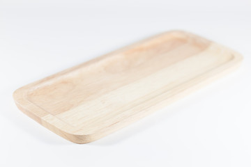 Wooden plate isolated on white background