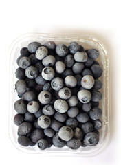 Blueberries in plastic packaging (top view)