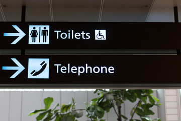Sign Toiles - Telephone singapore airport