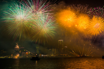 Fototapeta premium Fireworks Show along Victoria harbor in Hong Kong